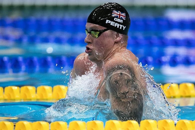 Britain’s Adam Peaty clocking a new world record time of 26.10sec in the men’s 50m breast heats at the World Championships. He broke it again, recording 25.95sec in the semi-finals. 