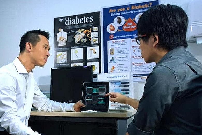 Left: A diabetes patient having a consultation with NUH endocrinologist Yew Tong Wei (far left). Below: A sample of the results sent to diabetic patients before their consultations in Britain, under its National Health Service.