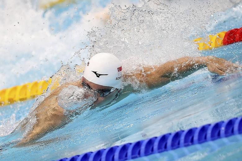 Joseph Schooling in the 100m freestyle heats yesterday. The 48.86sec timing - 17th overall - was well off his national record of 48.27 in Rio last year when he made the Olympic semi-finals.