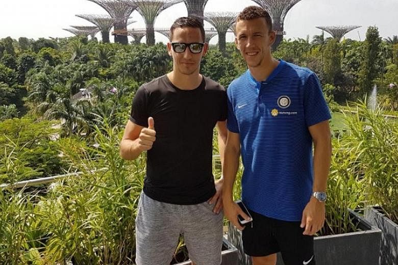 Home United's Stipe Plazibat (far left) and Inter Milan's Ivan Perisic hanging out at Gardens by the Bay. However, when they meet, they barely talk about football.