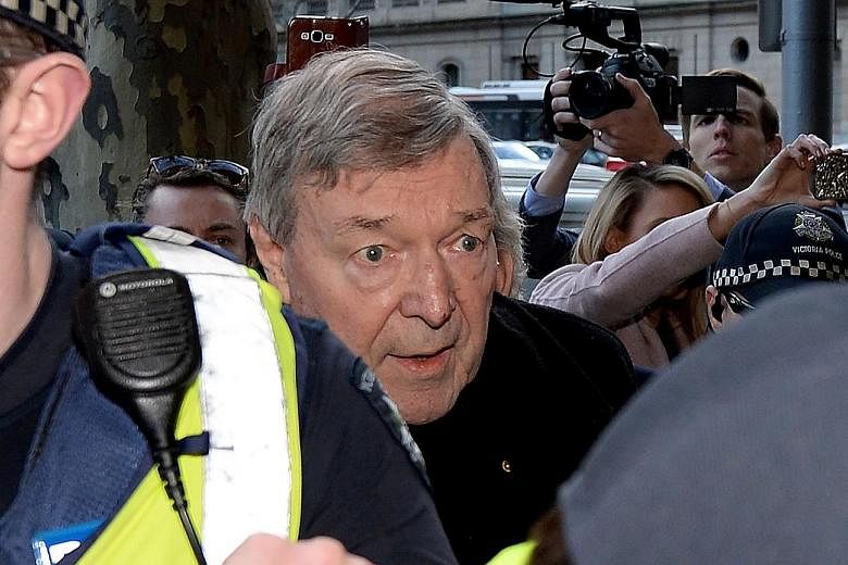 Cardinal George Pell arriving at Melbourne Magistrates' Court yesterday to answer charges of historical sexual abuse.