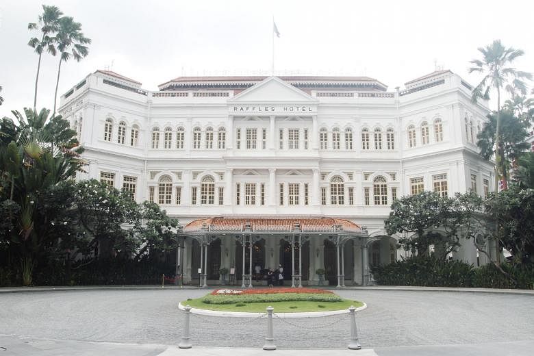 Above: The exterior of the Raffles Hotel is kept pristine white all year round. 