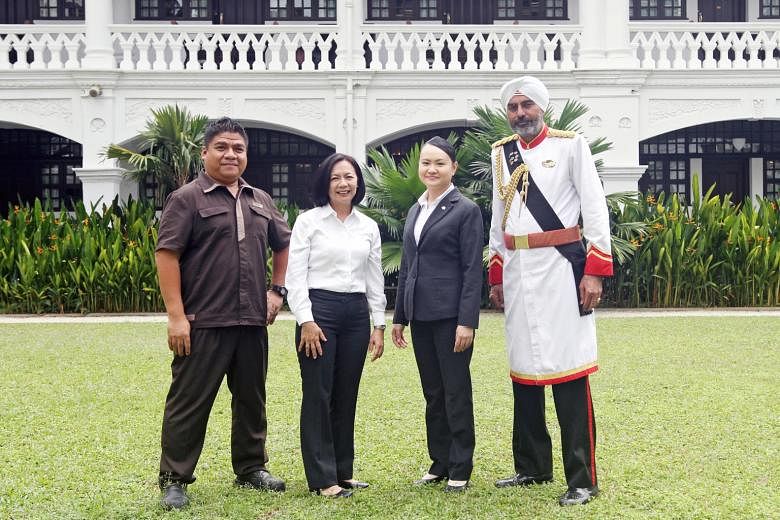 Among the many faces working to preserve the facade and hospitality of the colonial-era Raffles Hotel are (from left) Mr Samsol Misbah, assistant chief engineer; Madam Joey Chea, restaurant senior captain; Ms Serene Lim, food and beverage operations 