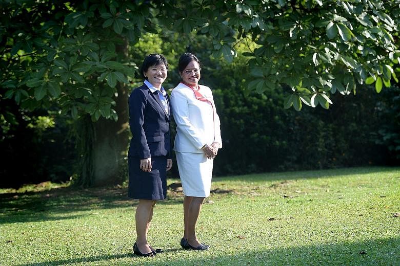 President's Award for Nurses winners Margaret Soon Mei Ling (far left) and Kuttiammal Sundarasan.