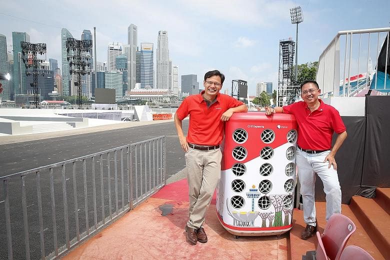 Innosparks general manager Gareth Tang (left) and SP Group managing director Jimmy Khoo with an Airbitat unit, one of 29 that will be plugged into the Underground District Cooling System, which serves Marina Bay Sands.