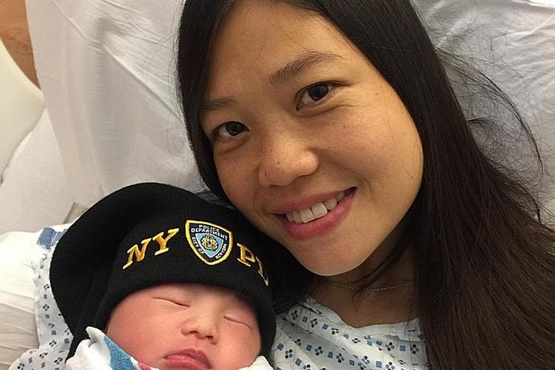 Baby Angelina, in an NYPD knit cap, with her mother, Mrs Sanny Liu.