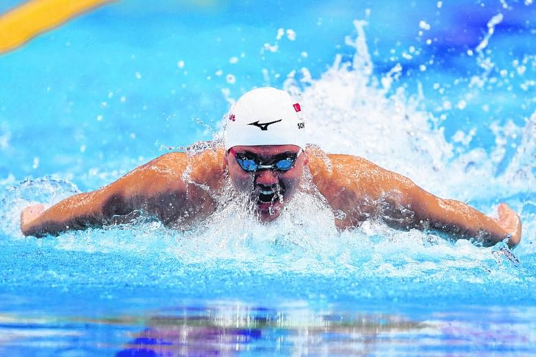 Singapore's Olympic Games champion Joseph Schooling winning his heat in 51.21sec yesterday to qualify for the 100m butterfly semi-finals. He was the fourth-fastest qualifier.