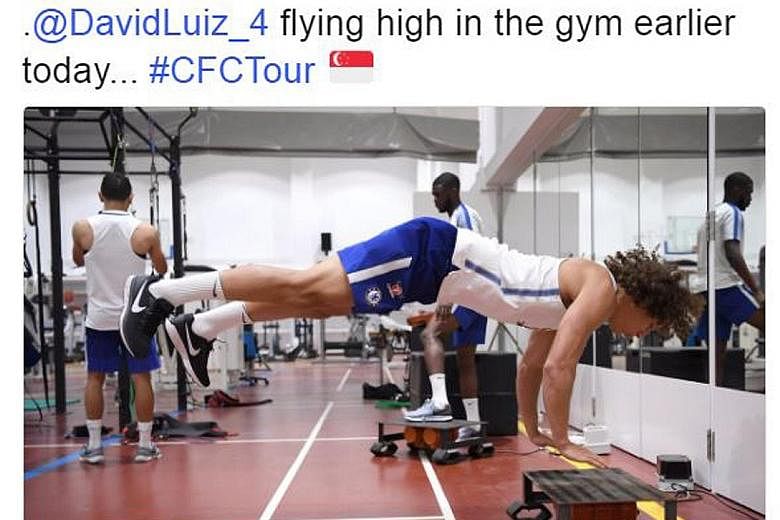 Look, ma, no hands. Chelsea's David Luiz shows that his training sessions can be a hair-raising experience sometimes.