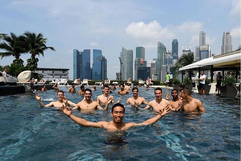 It's not quite synchronised swimming, but Japan international Yuto Nagatomo shows his Inter Milan team-mates how to pool their resources at the Mandarin Oriental.