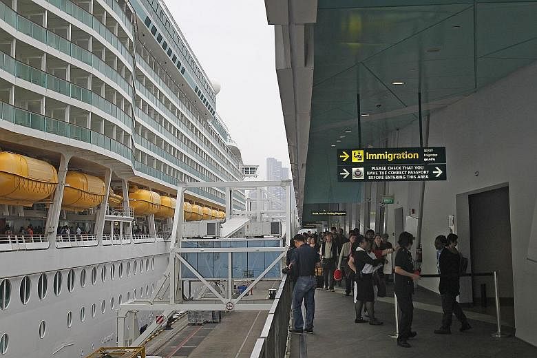 Travellers heading towards Immigration via a link bridge after disembarking from a Royal Caribbean cruise ship. Singapore has become a flourishing entry point for Indian cruise ship passengers, and to better accommodate guests from India, cruise oper