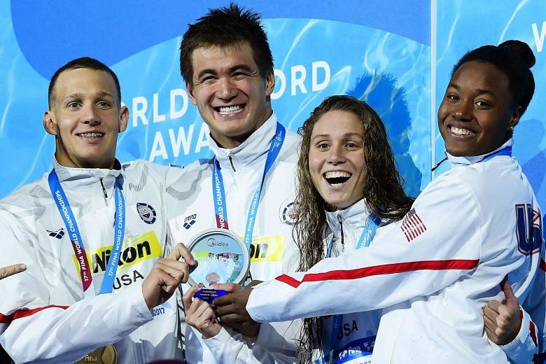 Swimming: Treble-gold Dressel helps US break mixed 4x100m freestyle ...