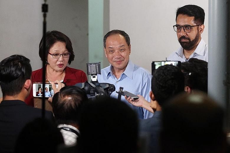(From far left) Aljunied GRC MPs Sylvia Lim, Low Thia Khiang and Pritam Singh speaking to the media on the Aljunied- Hougang Town Council's lawsuit against them before Mr Low's Meet-the-People Session last Wednesday in Bedok Reservoir Road.
