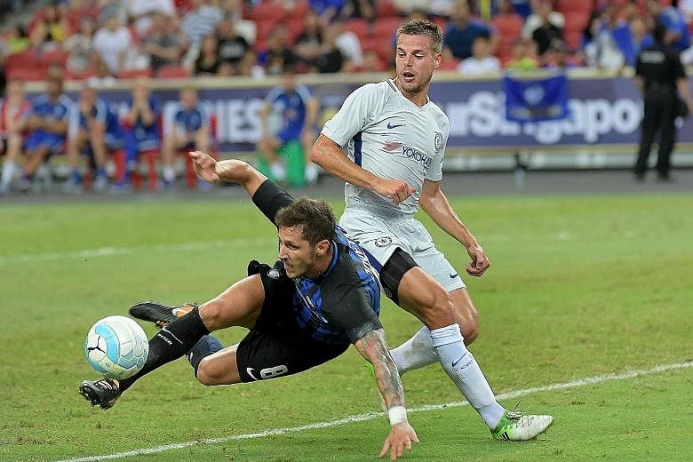 A duel between Stevan Jovetic (left) and Cesar Azpilicueta resulted in a penalty for Inter Milan. Jovetic had his spot kick saved by Chelsea goalkeeper Thibaut Courtois, but scored from the rebound to open the scoring for Inter.