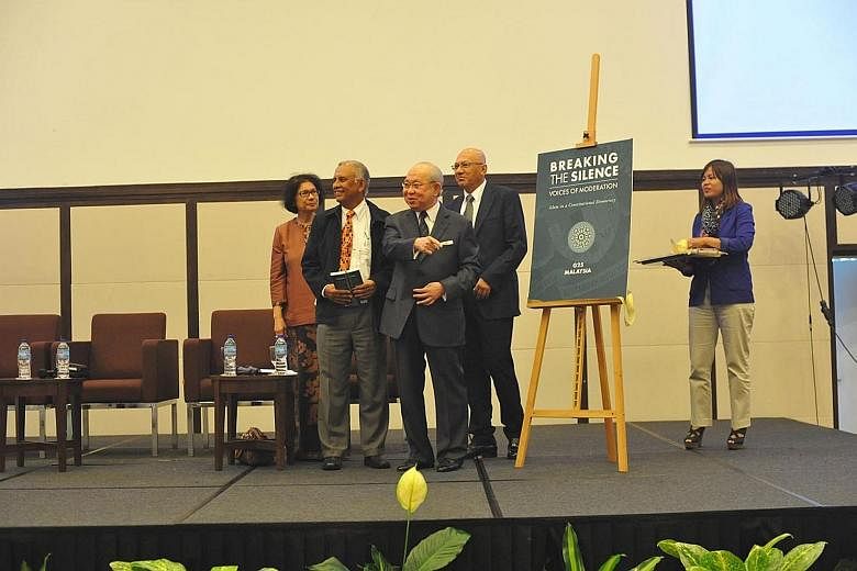 Umno MP Tengku Razaleigh Hamzah (third from left) launching the book in December 2015. With him were (from left) former judge Datuk Noor Farida Ariffin, former secretary-general at the Ministry of Finance Tan Sri Mohd Sheriff Mohd Kassim and a member