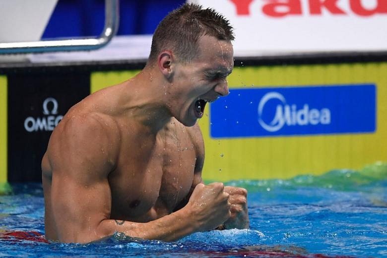 Swimming: Dressel makes history with three world golds in one night ...