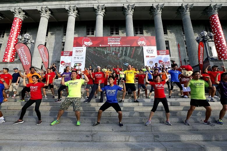 A mass workout held on the steps of the National Gallery yesterday was attended by some of the roughly 10,000 people who took part in the launch of the second edition of GetActive! Singapore at the Padang.