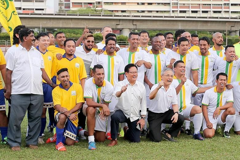 Remembering the Rams' glory days are former Woodlands manager R. Vengadasalam (far left), FAS president Lim Kia Tong (front row, fourth from left), former FAS chief Ho Peng Kee (next to Lim) and former players.