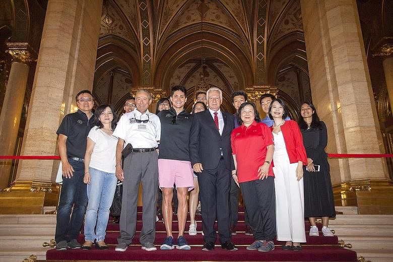 The Singapore students with (front row, from right) Ambassador Ng, May Schooling, Deputy Speaker Jakab, Joseph and Colin Schooling with Jasmine and Jimmy Teo, the Schoolings' friends.