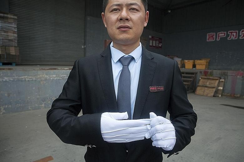 Mr Tang Hongliang, a driver for JD.com luxury service, does not look like a typical Chinese package courier. Instead of hot noodle lunches, he delivers luxury goods such as designer handbags.