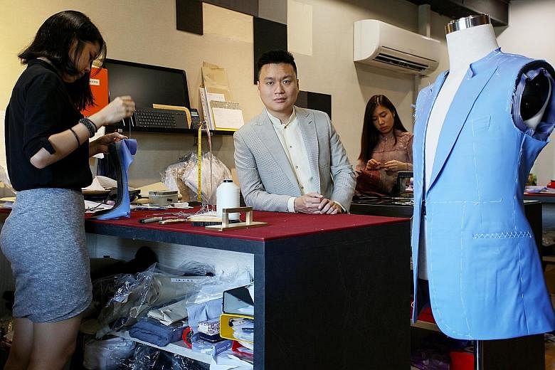 Mr Alvin Lin, co-owner of tailoring firm The Prestigious, donates to the Intercultural Theatre Institute.