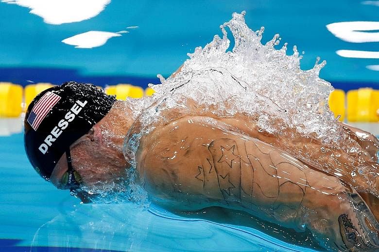 Caeleb Dressel of the United States on his way to winning the 100m fly in Budapest last Saturday. He came within four-hundredths of a second of Michael Phelps' world record on a day when he won three gold medals.