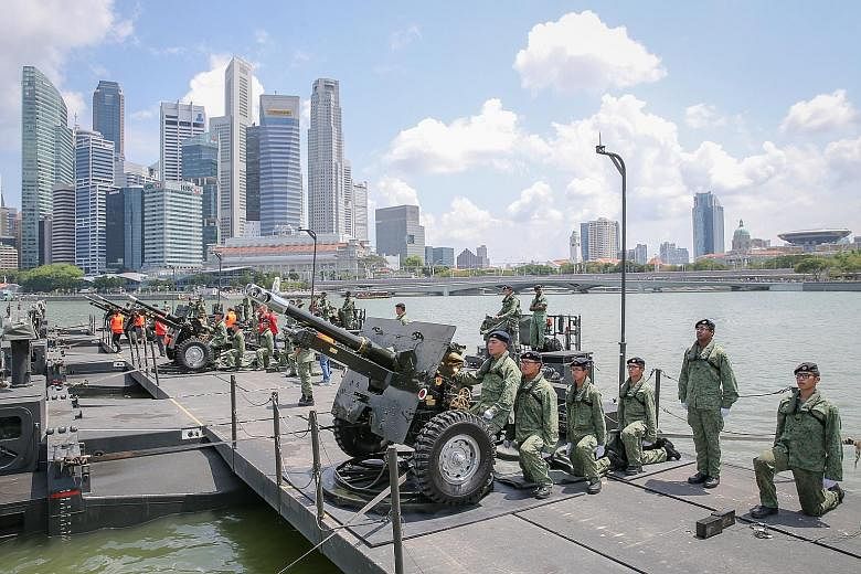 Army personnel in position for a rehearsal of the 21-gun presidential salute. The four howitzer guns will be placed on board the M3G military raft, which will bring the action closer to the audience. The M3G raft is formed by five amphibious vehicles
