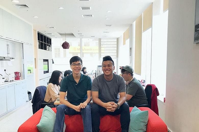 Hapz co-founders Lai Xin Chu (left) and Kendrick Wong at the firm's office in The Central. Hapz helps users save on tickets for attractions and events.