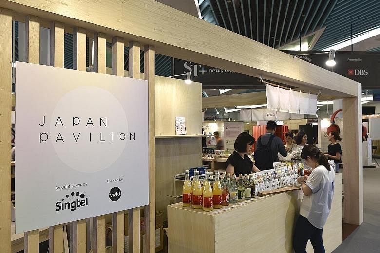 Exhibitors setting up their booths and products in preparation for the start of the Singapore Coffee Festival today. The first day is for trade members and the media, while the event will be open to the public from Friday to Sunday.
