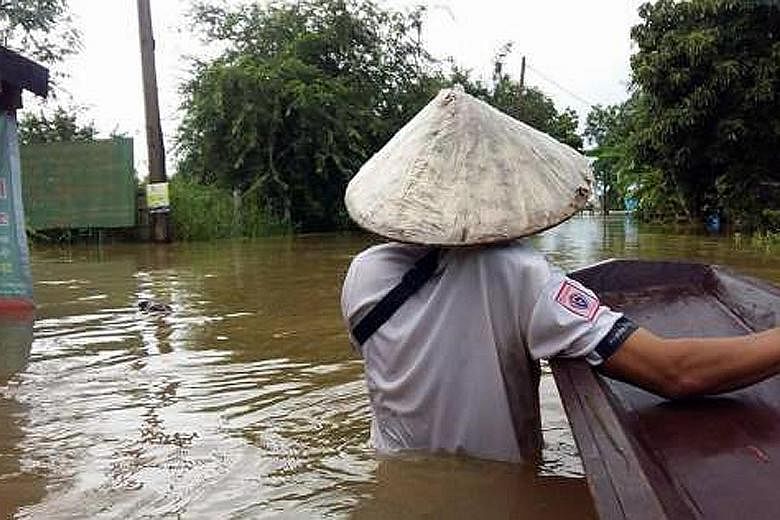 Tambon Tha Rae, Muang district, in the hardest-hit province of Sakon Nakhon. Ten provinces are still battling severe floods as rain continues to lash the upper part of the north-east.