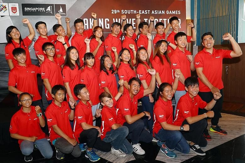 Radiance Koh (bottom row, far left) and Max Teo (bottom row, fourth from left) are among the 13 team members making their debut in Singapore's 21-strong SEA Games sailing team this year. The average age of the squad is 17.