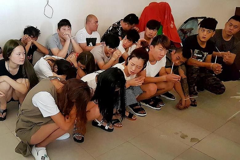 These Chinese nationals were among the 215 suspects arrested for allegedly running an online scam from Cambodia. The victims in China were tricked into sending nude photos, only to be blackmailed by the gang.