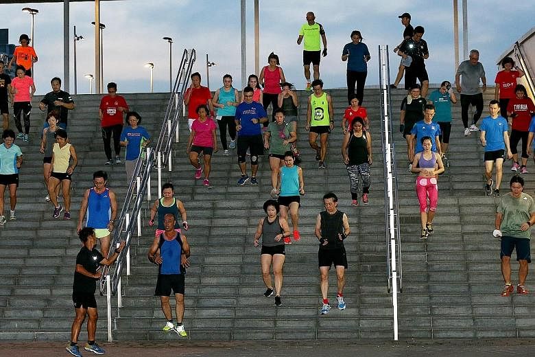 The Community Run at the Singapore Sports Hub caters to both serious and recreational runners who are grouped according to their fitness levels and targets. They undergo customised programmes involving various exercises.