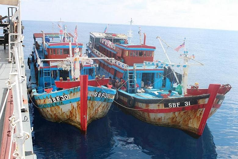 Two Vietnamese boats with 2,000kg of fish were detained by the Malaysian Maritime Enforcement Agency near Pulau Mengalum in Sabah last month.
