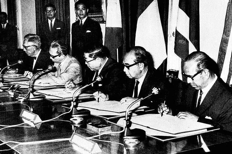 Singapore's then Foreign Minister S. Rajaratnam (right) at a meeting in Bangkok to sign the founding of Asean declaration on Aug 8, 1967, with (from left) foreign ministers Narciso Ramos of the Philippines, Adam Malik of Indonesia, Thanat Khoman of T