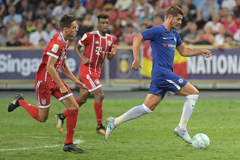New Chelsea striker Alvaro Morata racing ahead of Bayern Munich players at the recent International Champions Cup Singapore tournament. The £58 million signing was initially wanted by Blues rivals Manchester United.