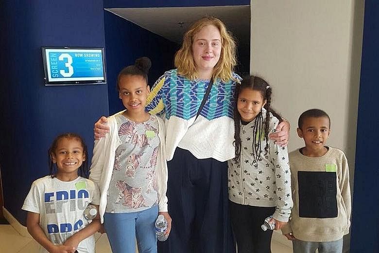 Singer Adele hosted a movie screening for children affected by the Grenfell Tower inferno last Thursday.