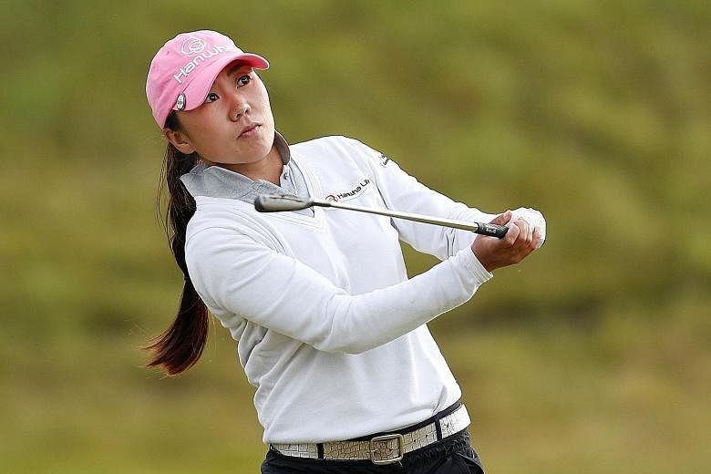 Six birdies lifted South Korean golfer Kim In Kyung (left) to the Women's British Open 54-hole record of 199 on Saturday - one better than Thailand's Ariya Jutanugarn at Woburn 12 months ago. The 29-year-old's faultless third round of six-under 66 ga