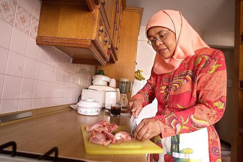 Left: Madam Halimah Yacob, seen here cooking in the kitchen of her HDB flat, is known for being down to earth and close to the ground. She said that living in the heartland gave her a keen sense of what bothered people and the daily frustrations they