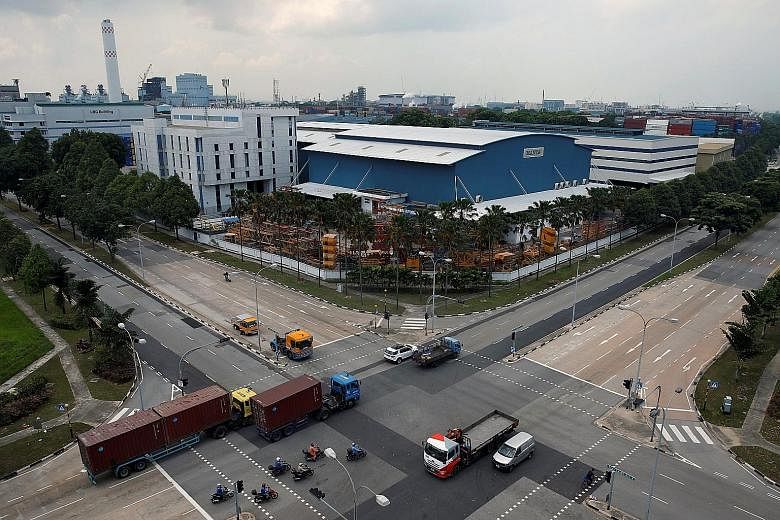 Factories in the Jurong industrial estate. "Most of the smaller guys operate warehouses, logistics properties and factories where the occupancy has been declining and the challenges will continue easily over six, nine months before we see any recover