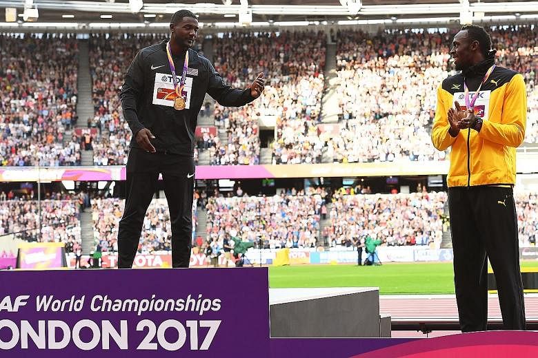 American Justin Gatlin on the podium after winning the gold medal ahead of Usain Bolt in the men's 100m final at the World Athletics Championships. He has served two drugs bans, in 2001 and 2006.