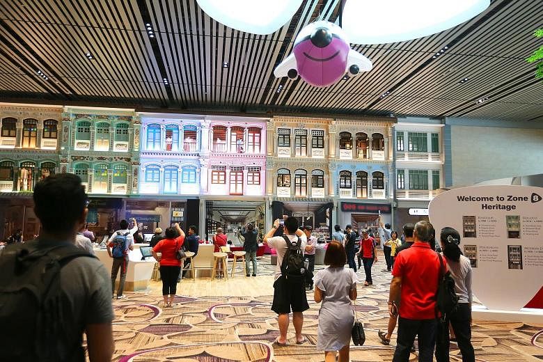One of the highlights of Changi Airport's Terminal 4 is the heritage zone, which displays the evolution of shophouse architecture from the 1880s to the 1950s.