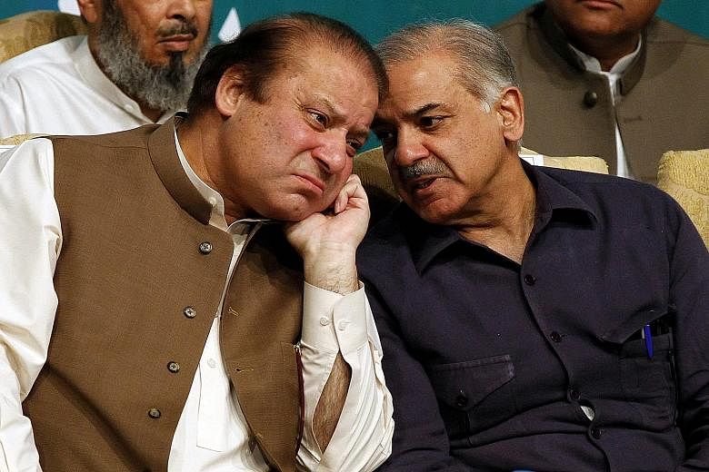 Mr Shahbaz Sharif (right, pictured with his brother Nawaz) will continue as chief minister of Punjab province.