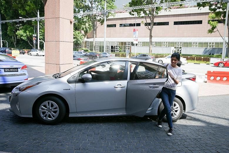 Reporter Linette Lai using the UberX service for her journey from the News Centre in Toa Payoh North to the floating platform, while her colleague Zhaki Abdullah used a Mobike.