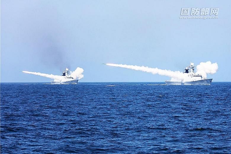 The Chinese navy and air force have flexed their muscles in live-fire drills in seas adjacent to the Korean peninsula, amid regional tensions over North Korea's pursuit of nuclear weaponry, Agence France-Presse reported. The "large-scale" exercises w