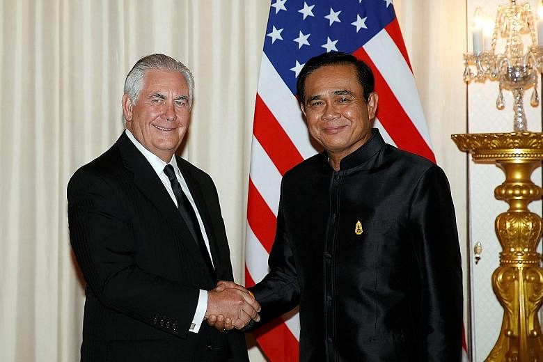 US Secretary of State Rex Tillerson with Thai Prime Minister Prayut Chan-o-cha at the Government House in Bangkok yesterday. Mr Tillerson is the most senior US official to visit the kingdom since its 2014 military coup.