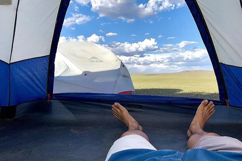 Mr Tay endured 40 deg C heat during his trek through the Gobi Desert, and was forced to continue his journey on bike after losing time when he was laid low by blisters. He and his team pitched tents whenever they could not find people to stay the nig