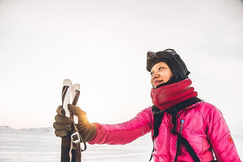 Ms Eirliani Abdul Rahman learning polar survival skills in the frozen Canadian north to prepare for her South Pole expedition in December next year. Her training includes cross-country skiing as well as dragging and flipping a 25kg truck tyre up and 