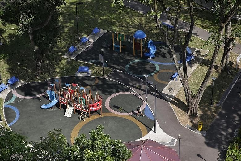 Ms Lin Shiyun (centre, in blue and white top) started Let's Go Play Outside! for children from low-income families in Toa Payoh Lorong 1, where there are some blocks of rental flats and a park with two playgrounds (below). Initially, the activities w