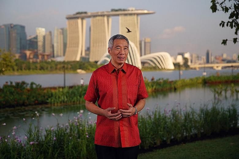 Prime Minister Lee Hsien Loong delivering his National Day Message at Bay East Garden. He said that siting the Founders' Memorial there would allow Singaporeans to "remember the values of our founding leaders, see what they have built and commit ours