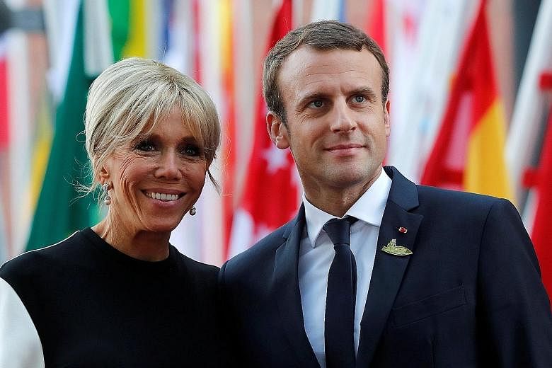 French President Emmanuel Macron with his wife Brigitte. During his presidential campaign, Mr Macron had talked about his wife having a "real role", but had been clear that she would not be paid. A source said that the presidency will clarify Mrs Mac